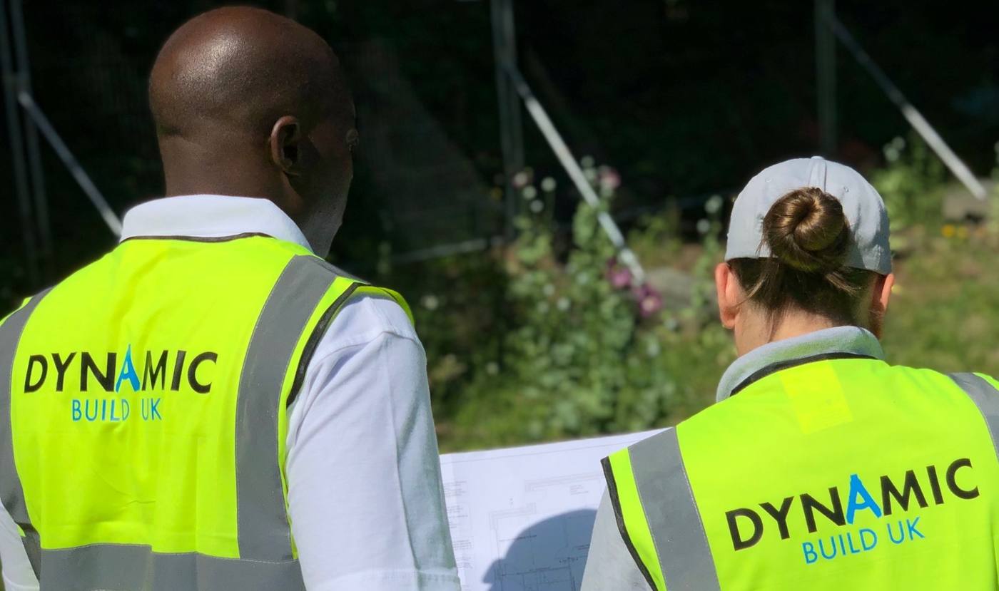 Dynamic Build UK team reviewing drawings on site
