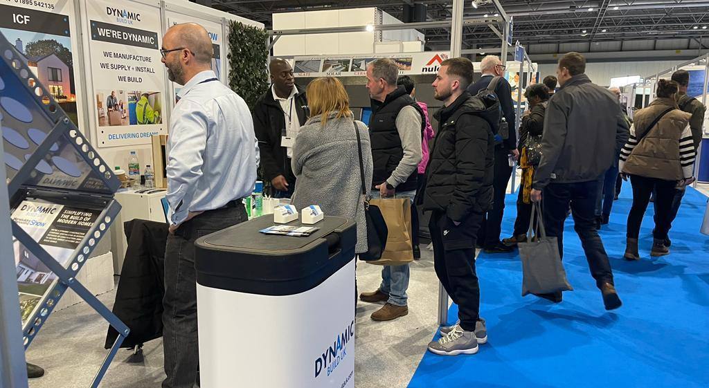 Dynamic Build UK stand busy with visitors at a self-build show